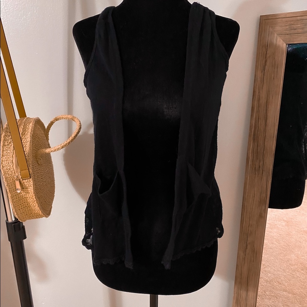 black sweater vest